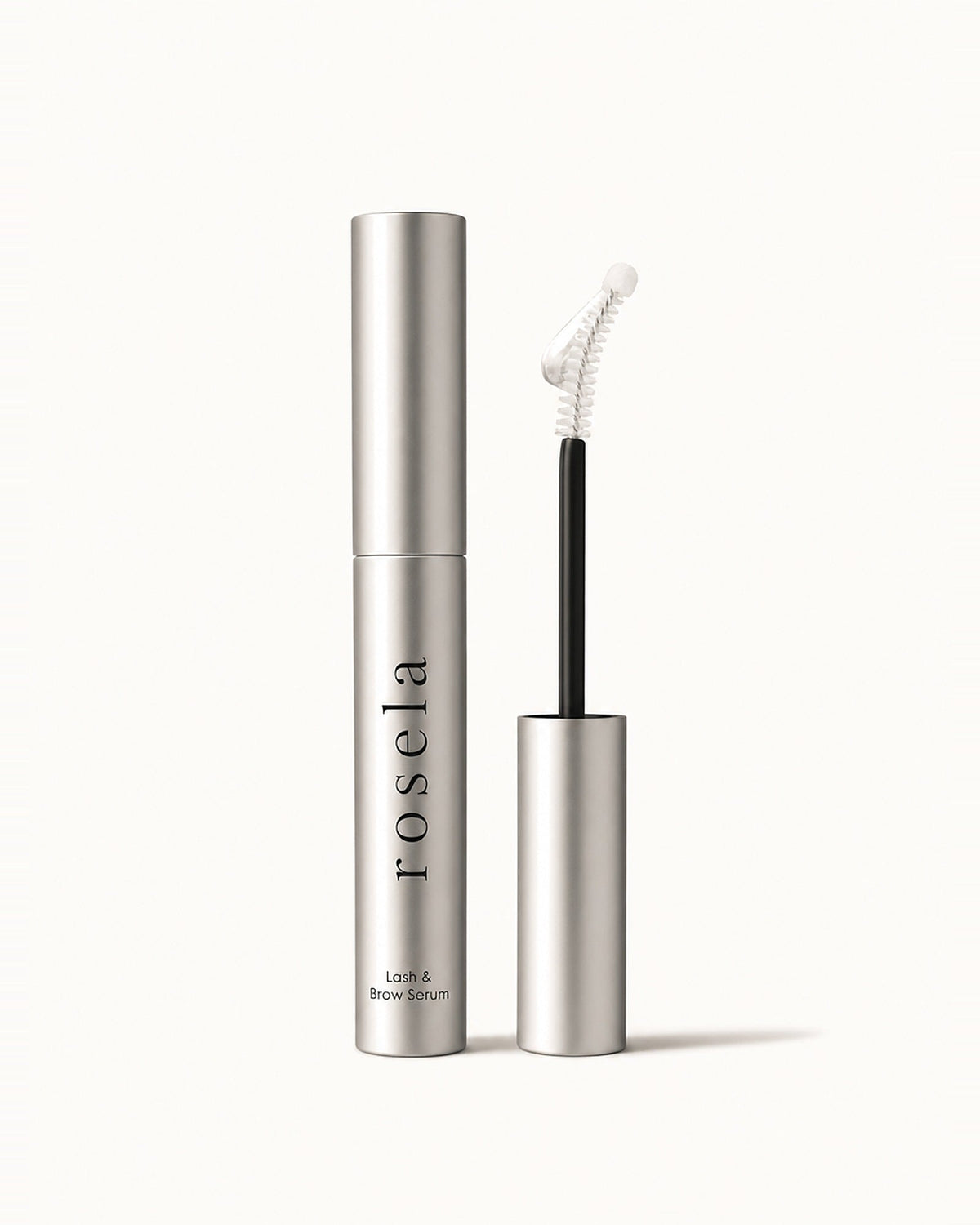 Rosela Nightly lash and brow serum tube with spoolie applicator